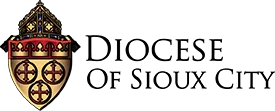 The heraldic crest, adorned with red and gold designs on a black background, stands as a timeless emblem of distinction and endorsements for the Diocese of Sioux Fall.