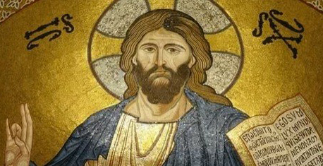 Mosaic of a bearded man with a halo, holding a book and raising one hand in a blessing gesture—an enduring testament to timeless testimonials captured in vibrant artistry.